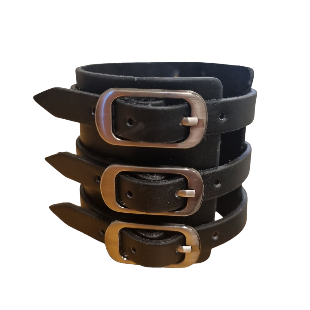 Svart armband med tre spännen